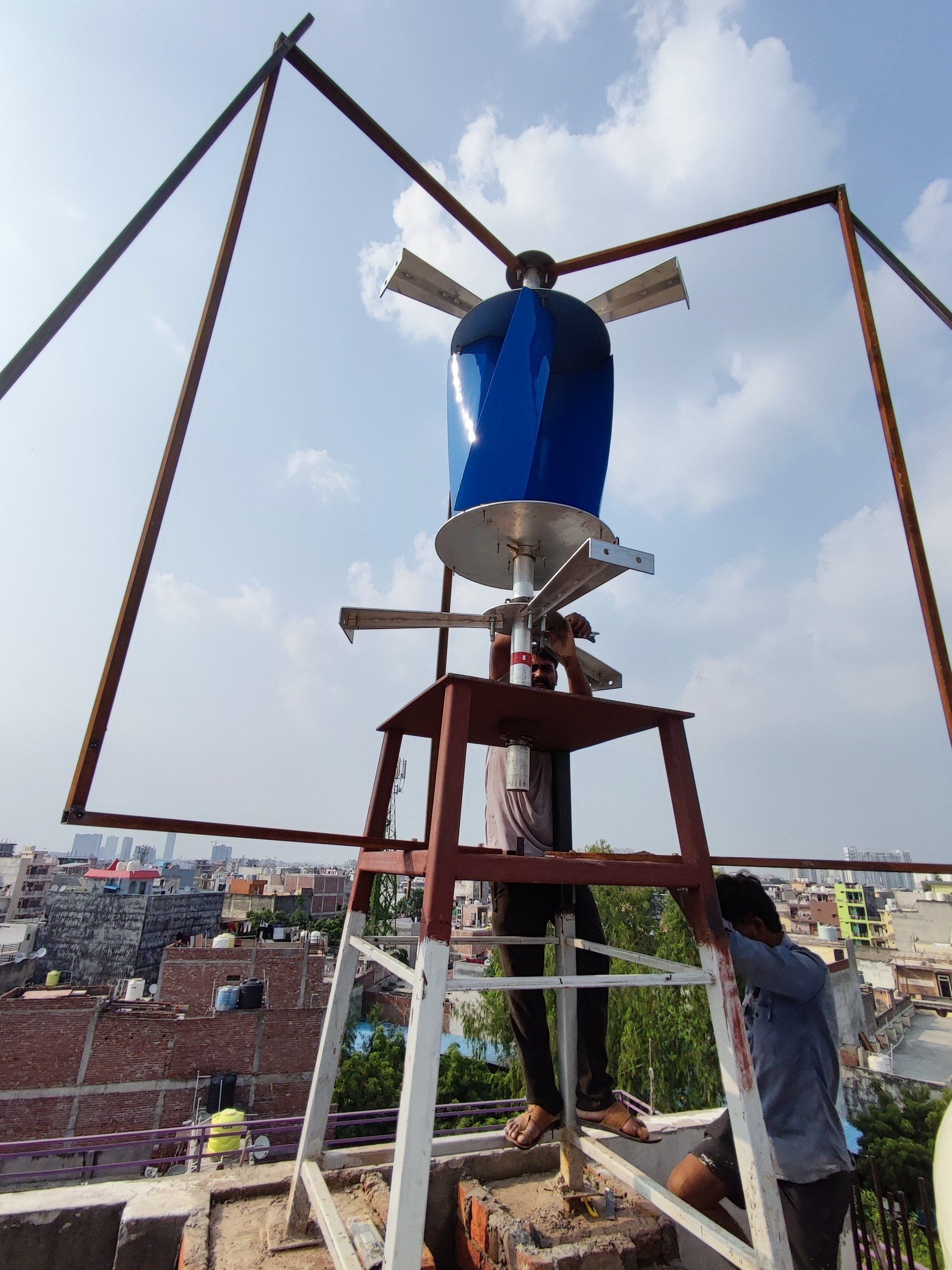 The rooftop stand raised and the blue inner rotor fitted on installation day, 16 September 2026.